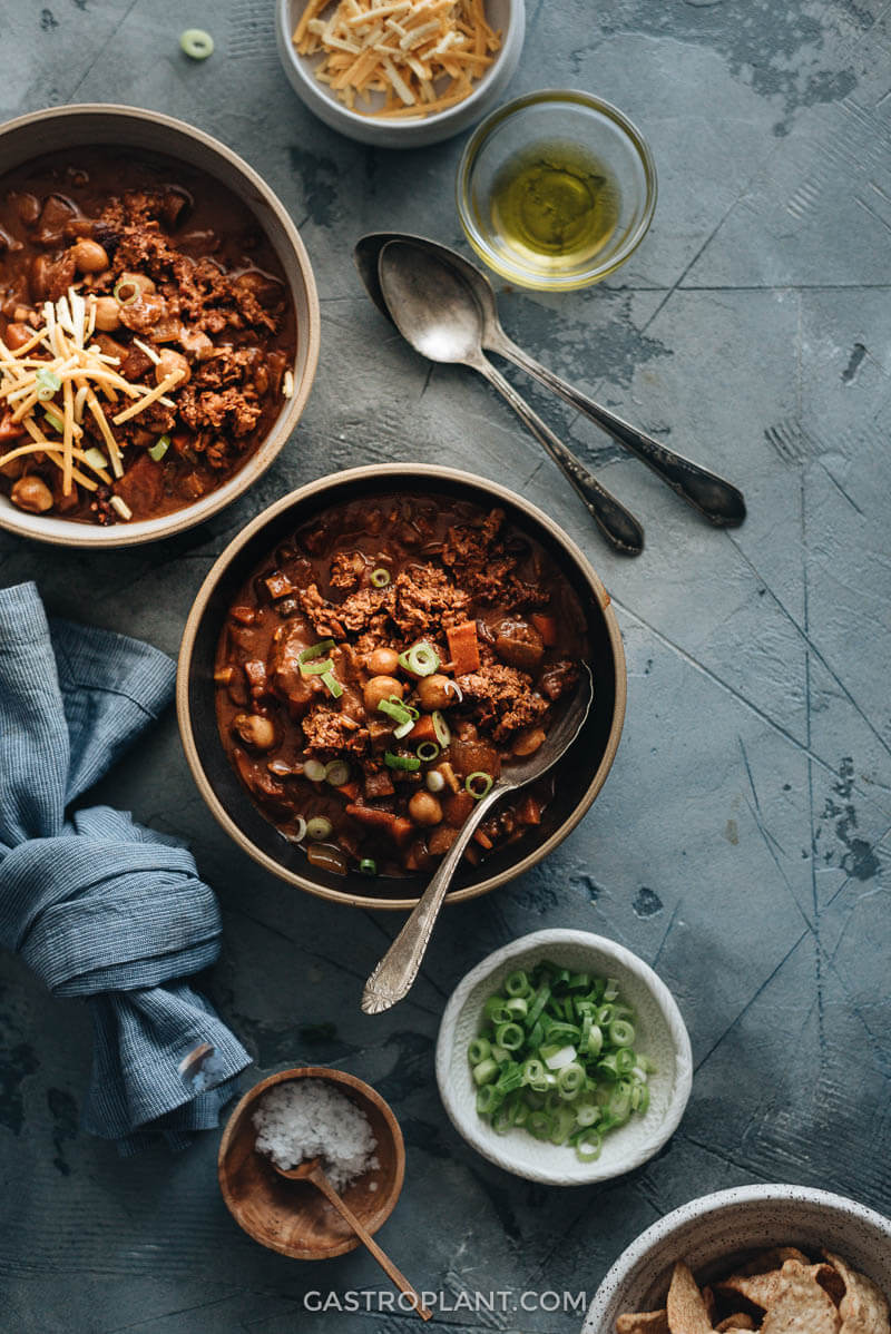 Vegan Chili in Two Bowls with toppings