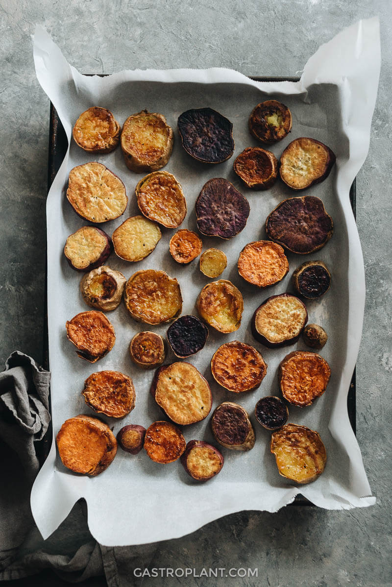 Crispy roasted sweet potatoes on baking sheet