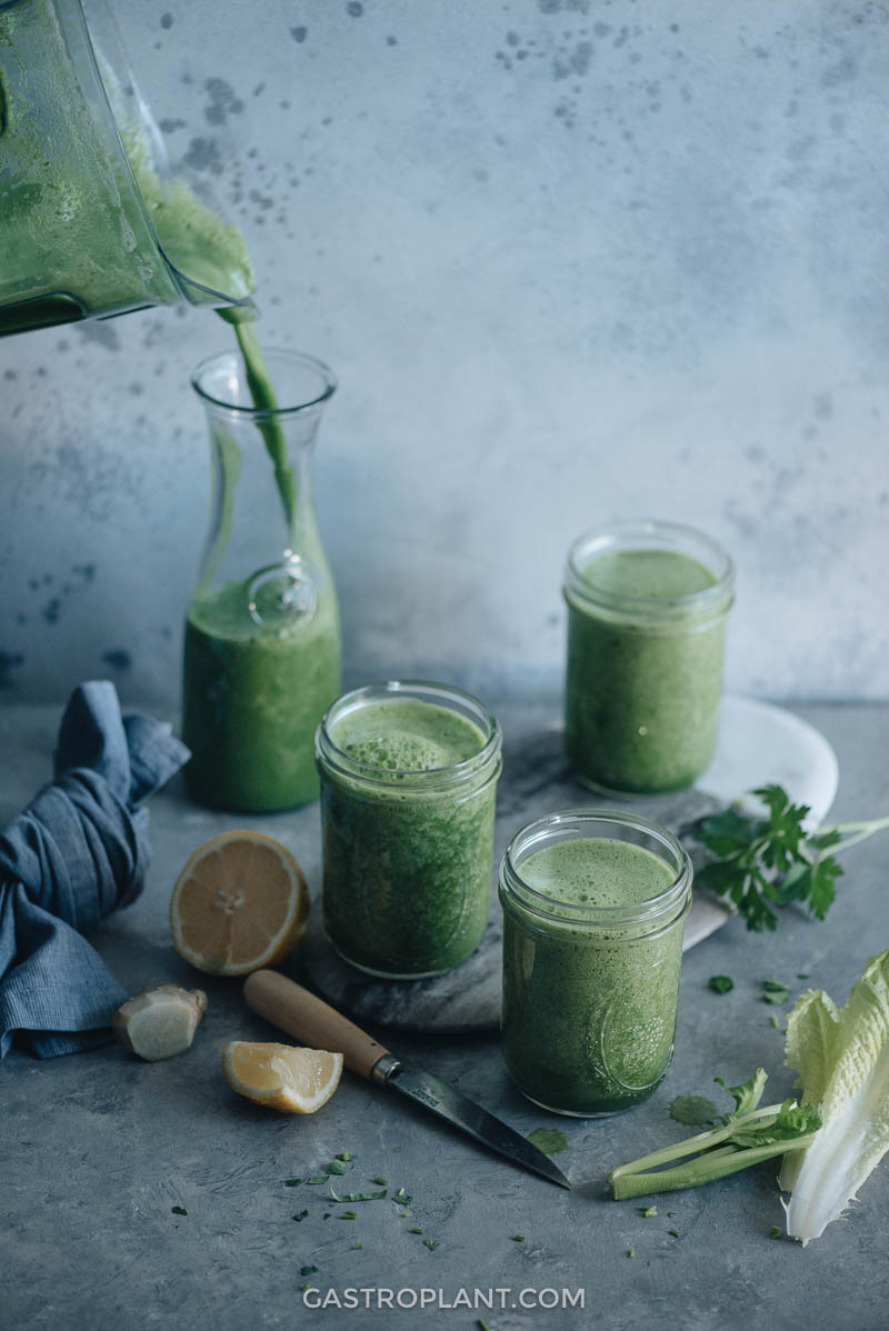 Morning green smoothie in glasses on table