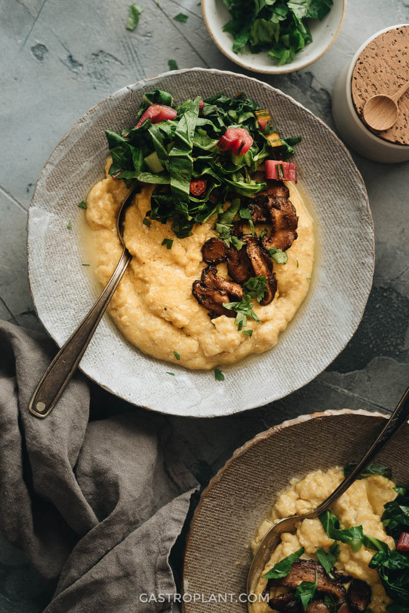 Two bowls of vegan cheese grits for breakfast