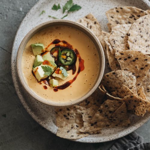 Restaurant style vegan queso cheese dip as appetizer