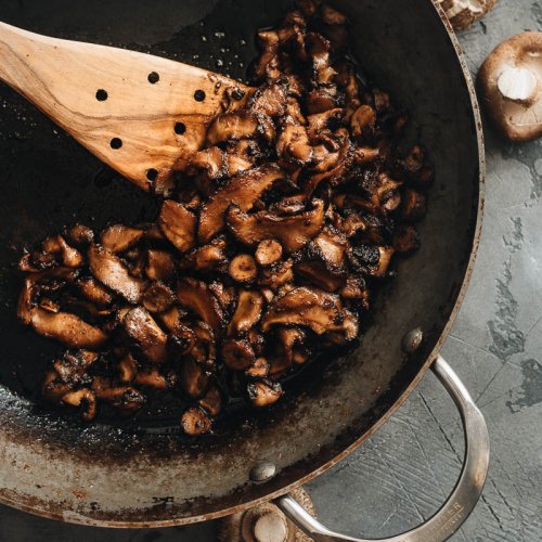 Crispy vegan shiitake mushroom bacon hot in the skillet