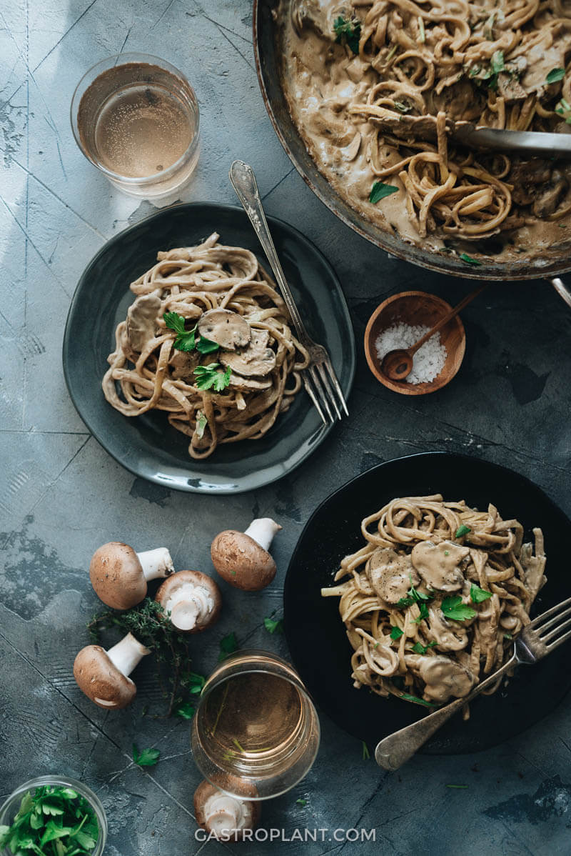 Dinner of creamy vegan mushroom pasta is served