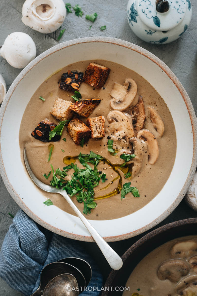 Vegan cream of mushroom soup in a white bowl
