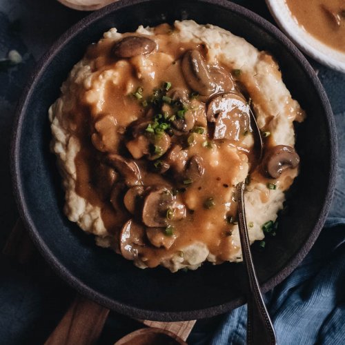 Easy vegan mushroom gravy on top of mashed potatoes