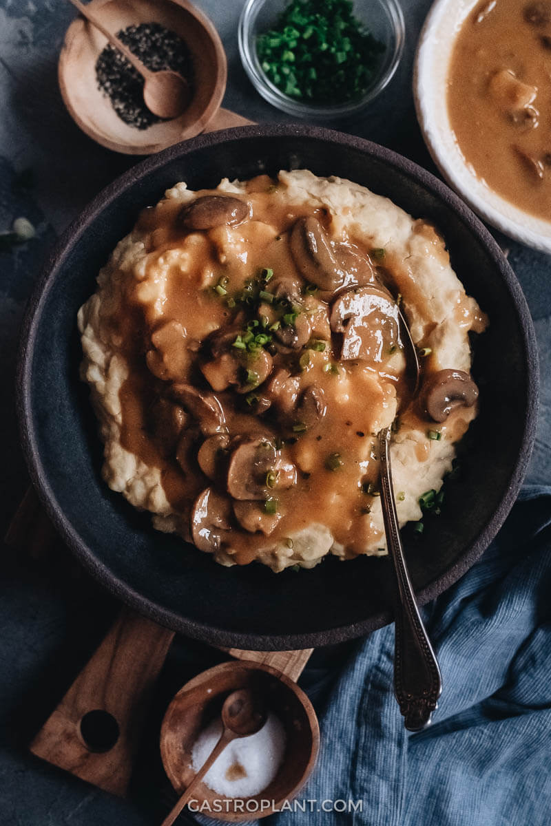 Easy vegan mushroom gravy on top of mashed potatoes