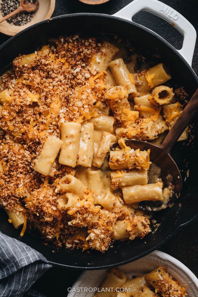 Close up of cheesy baked vegan mac and cheese