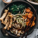 Square photo of vegan udon noodle soup