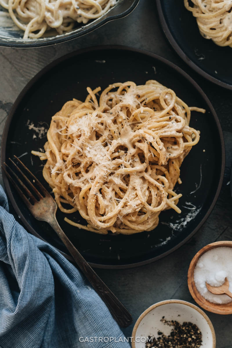 A plate of easy vegan cacio e pepe made from nuts