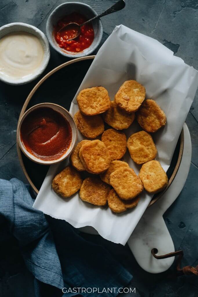 Crispy vegan chicken nuggets made from tofu on a plate
