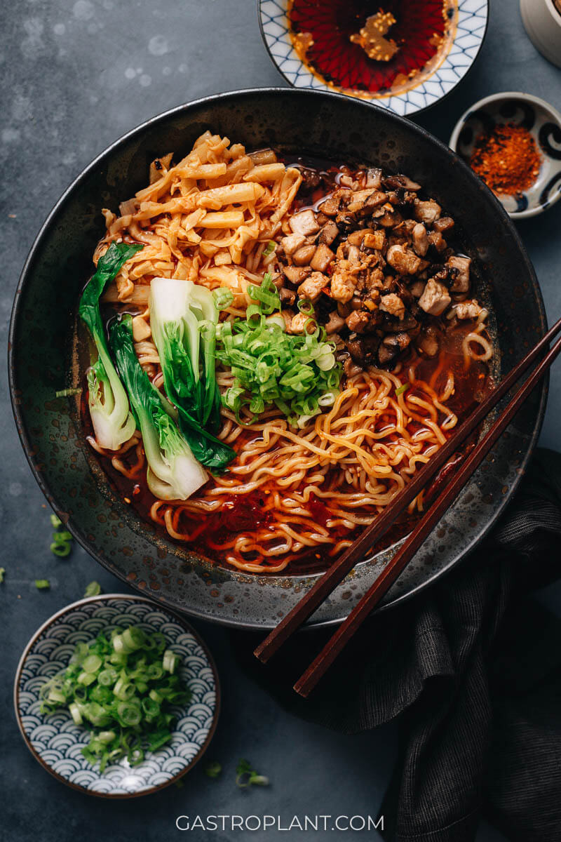 Spicy Japanese Tantanmen ramen with bok choy, tofu, mushrooms, and bamboo shoots