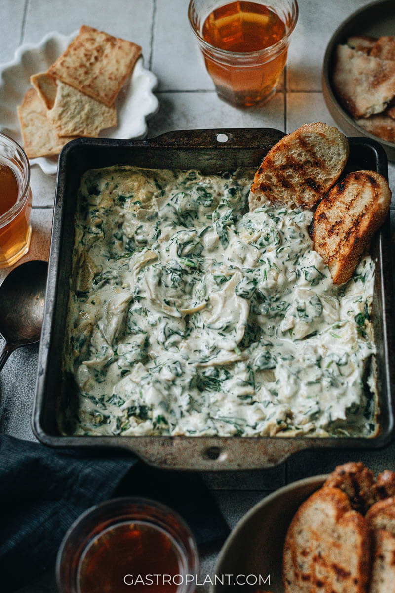 Extra creamy spinach artichoke dip with grilled toast