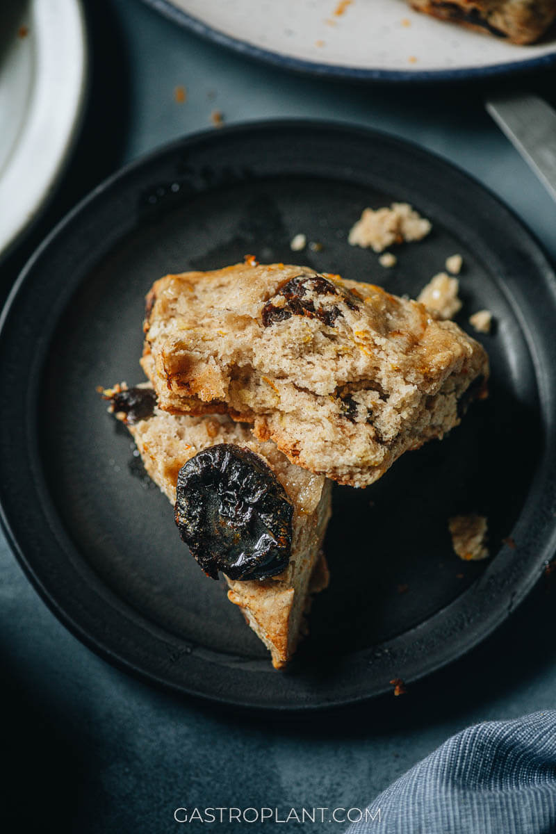 The crumbly interior of a broken prune scone